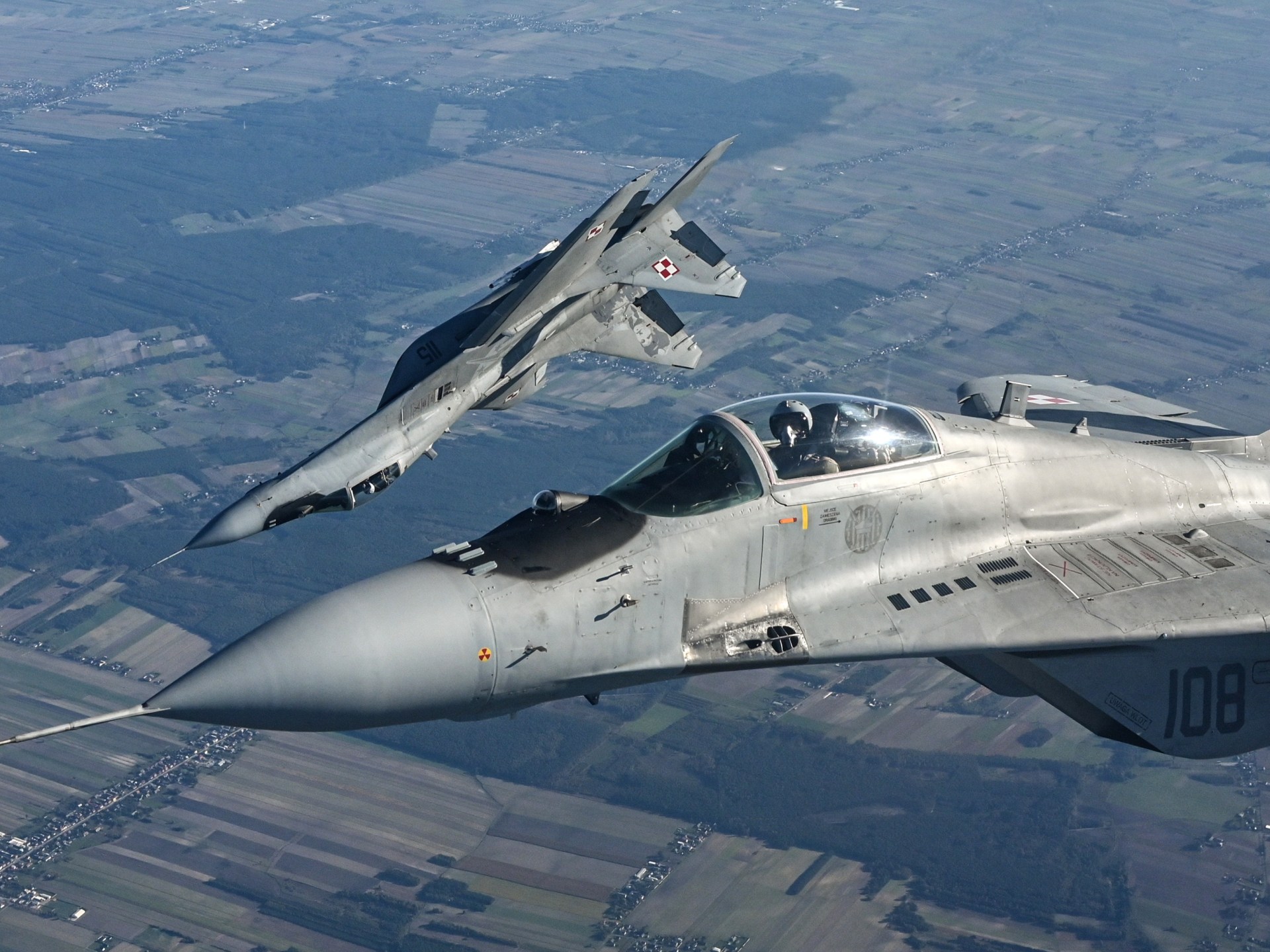 مستشار ألمانيا يحذر من تهديد المسيّرات ودول من الناتو تجري تدريبات في بولندا